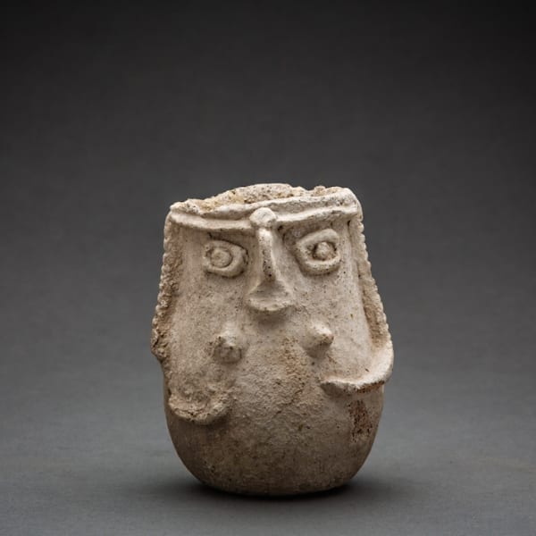 Anthopomorphic Jar With Facial Features in Relief
