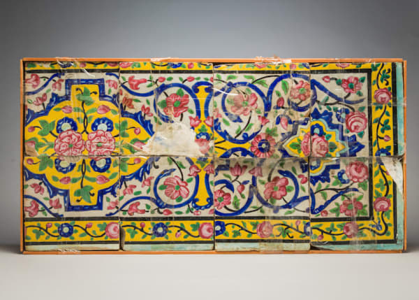Panel of Persian earthenware tiles, painted in polychrome glaze