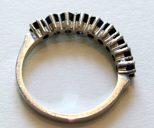 18 Karat Gold Ring Set With 9 Genuine Blue Sapphires