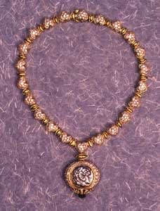 Diamond Studded Gold Necklace Featuring a Silver Tetradrachm of Alexander the Great