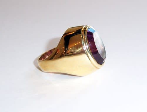 Oval Faceted Amethyst Set in an 18 Karat Gold Ring