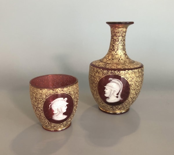 Glass vase and container in red with gold decorationn