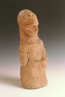 Komaland Sculpture of a Standing Man