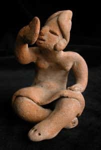Sculpture of a Seated Woman Looking at a Mirror