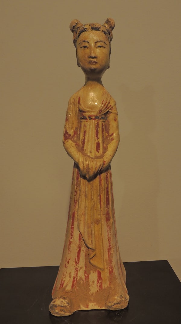 Sui period (581-618 AD) ochre-glazed terracotta figurine of a standing female court attendant