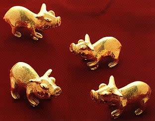 Four Gold Pendants of Peccaries