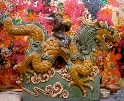 Ming Glazed Terracotta Depicting a Dragon and Rider