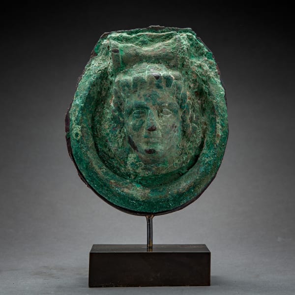 Bronze Hellenistic period handle, decorated with female head in relief