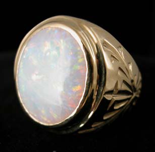 Gold Ring with Oval-Shaped White Opal