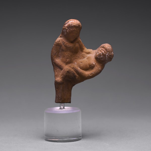 A Hellenistic Terracotta Group of a Mother and Child