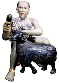 Asante Polychrome Sculpture of a Man Holding a Black Ram
