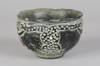 Intercultural black steatite vessel