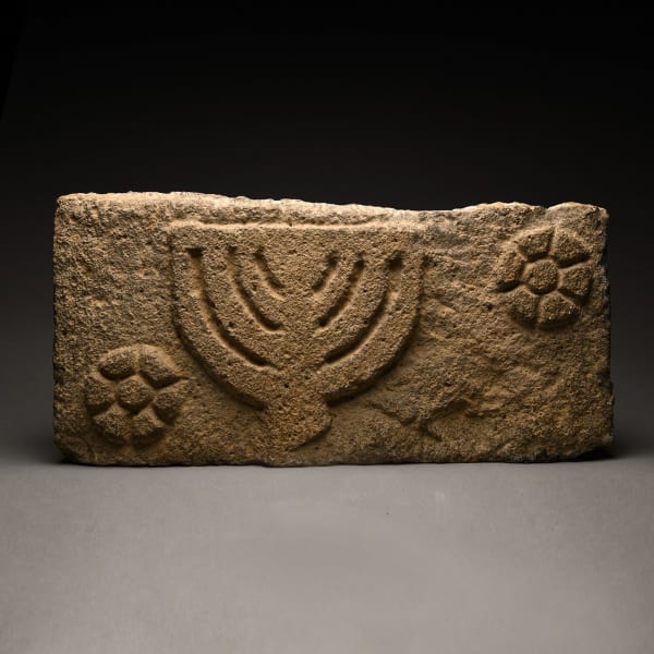 Basalt Synagogue Lintel Depicting a Menorah