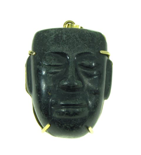 Olmec Stone Mask mounted in a gold pendant
