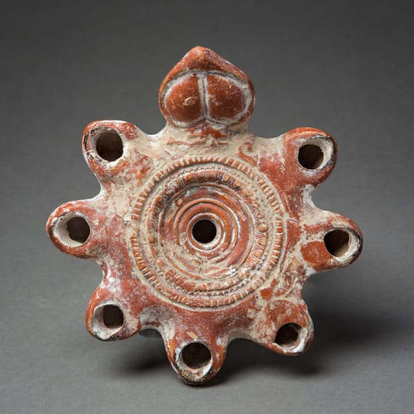 Roman Imperial period terracotta seven nozzle oil lamp