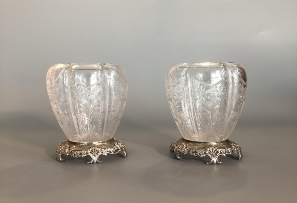 Pair of glass vases on stands