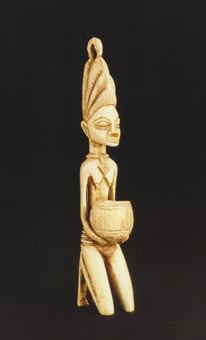 Yoruba Ivory Sculpture of a Kneeling Woman