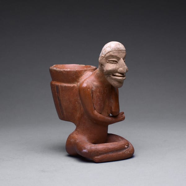 Sculpture of an Old Woman Carrying a Pot on Her Back
