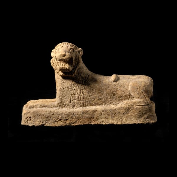 Assyrian Terracotta Sculpture of a Recumbent Lion