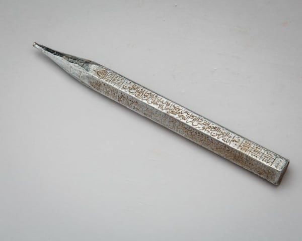 Silver pen with inscriptions