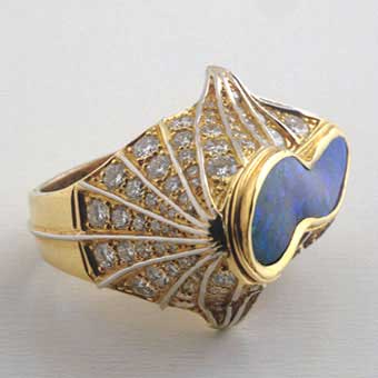 Diamond Studded Gold Ring Featuring an Australian Boulder Opal