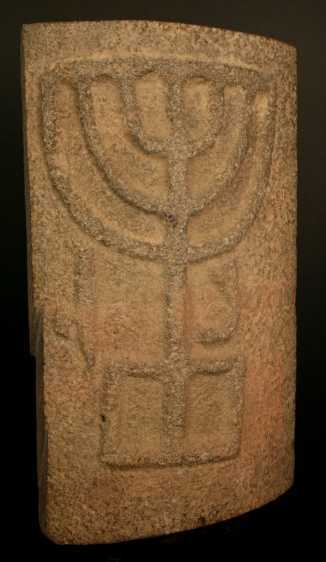 Roman Period Basalt Fragment from a Synagogue Column Depicting a Menorah