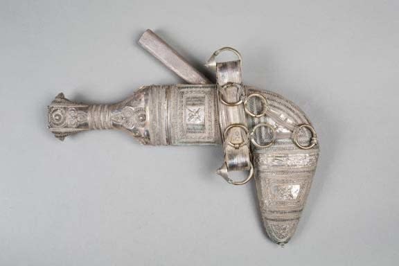 Curved decorated silver double dagger and sheath