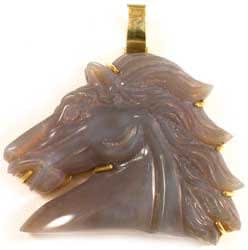Carved Lavendar Opal Depicting A Horse Head