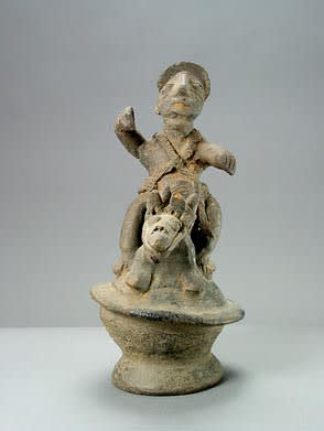 Yoruba Terracotta Sculpture of a Man Riding an Animal