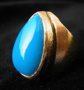 Gold Ring Featuring a Turquoise Stone