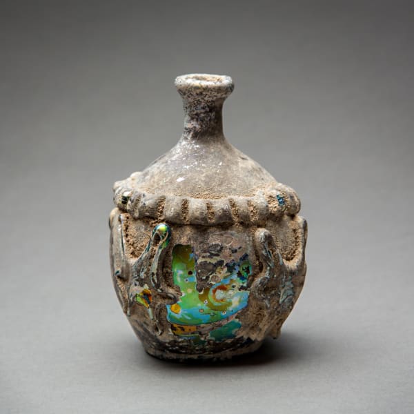 Early Islamic Aubergine Glass Bottle