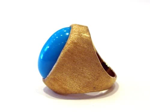 Cabochon Turquoise Set in an 18 Karat Gold Ring