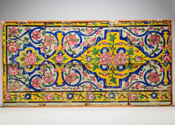 Panel of Persian earthenware tiles, painted in polychrome glaze