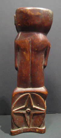 Elephant Bone Sculpture of a Seated Man