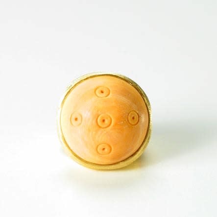 Gold Ring Featuring a Roman Ivory Game Piece with Circular Motifs