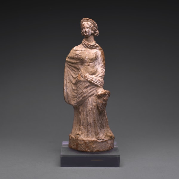 A Hellenistic Limed Terracotta Statue of a Standing Woman