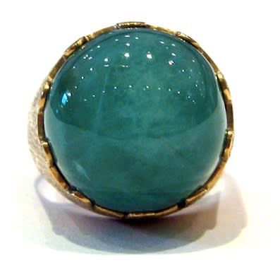 18k Gold Ring Featuring a 18.75c Cabochon Siberian Emerald
