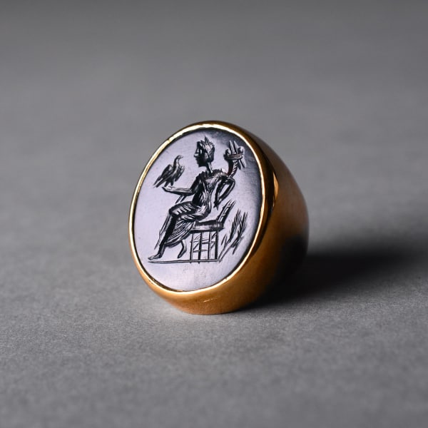 Gold Ring Featuring a Classical Revival Bloodstone Seal Depicting Fortuna