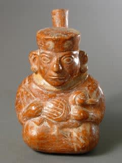 Moche Jar Depicting a Figure Holding a Duck