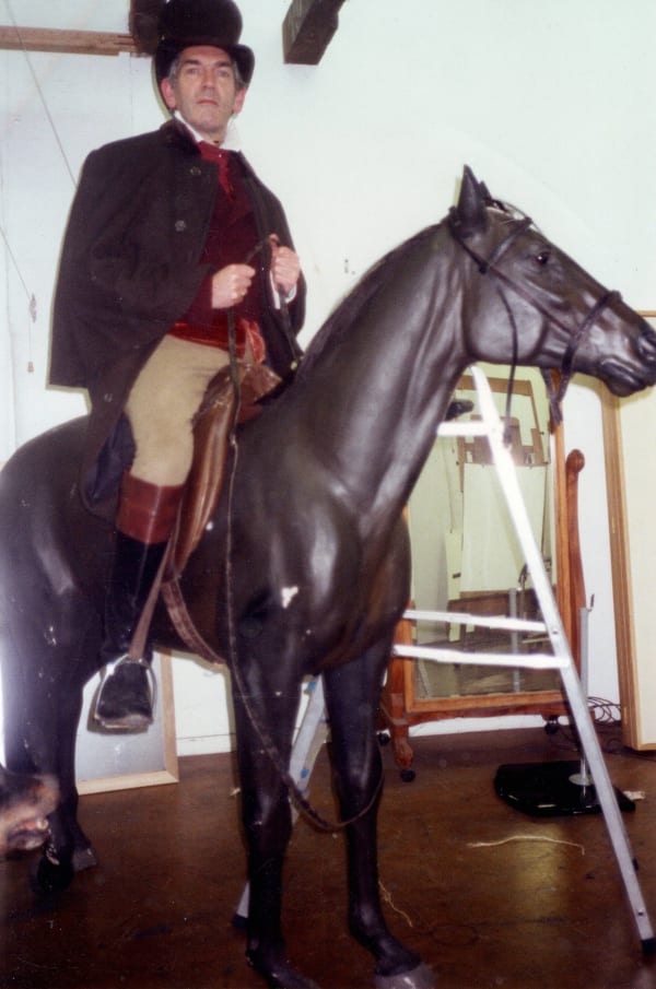 Anthony in pose, dressed as Mr Rochester