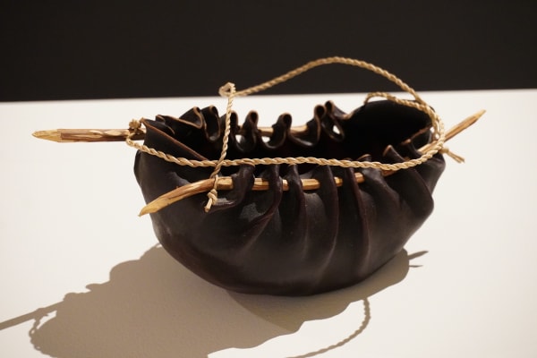 Aunty Vicki West pakana water carrier, 2024 kelp, tea tree and river reed 8 x 12 x 27 cm (overall size)