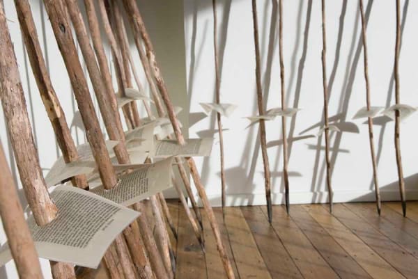 Julie Gough Some words for change, 2008 Tea tree sticks (33), paper, palstic & wax Installed, approx: 220 x 300 x 220 cm