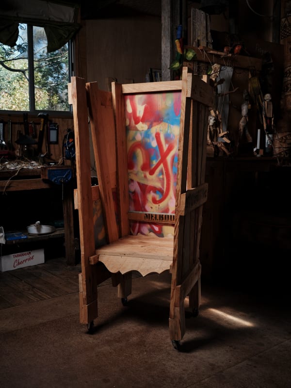 Gay Hawkes Melbourne - sedan chair, 2020 recycled pallet wood, enamel paint, castor wheels 123 x 48 x 56 cm