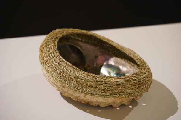Bronwyn Dillon palawa traditional weave basket, 2024 river reed & abalone shell 8 x 17 x 13 cm (overall size)