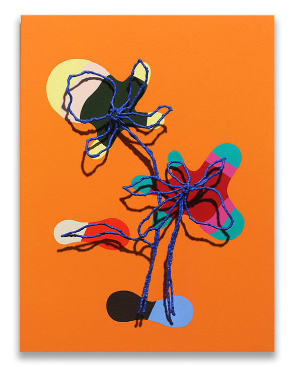 Modern wall sculpture of painted flower made of steel