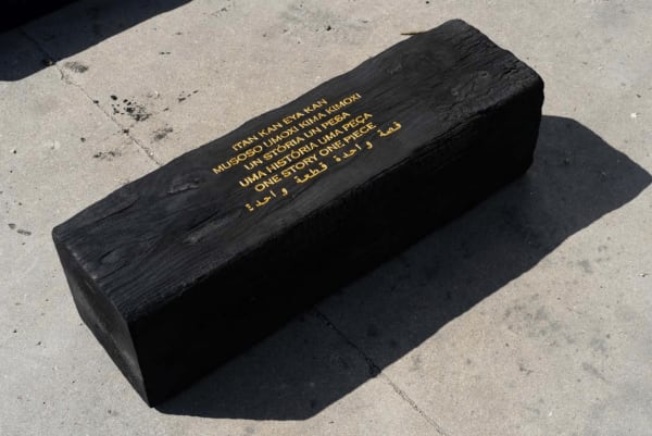 Grada Kilomba Untitled Poem (one story, one piece), 2022 Charcoal log with gold leaf engraving 11 3/4 x 11 3/4 x 35 3/8 inches 30 x 30 x 90 cm