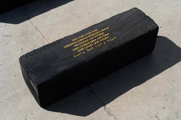 Grada Kilomba Untitled Poem (one load one story), 2022 Charcoal log with gold leaf engraving 11 3/4 x 11 3/4 x 35 3/8 inches 30 x 30 x 90 cm