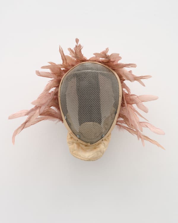 Allison Janae Hamilton Pink Feather Mask, 2021 Vintage metal and leather fencing mask, feathers 13 x 18 x 10 inches 33 x 45.7 x 25.4 cm (AJH.18793)