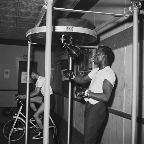Kwame Brathwaite, Untitled (Miles Davis with Speed Bag, Harry Wiley's Training Gym), 1964 c., printed 2020