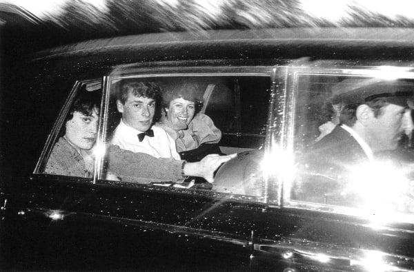 Dafydd Jones, Natasha Fraser and Benjamin Fraser leaving a party at dawn, 1981